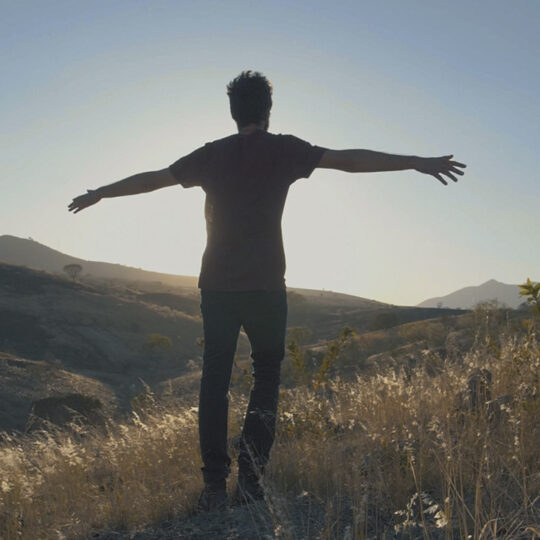 man-enjoying-the-wind
